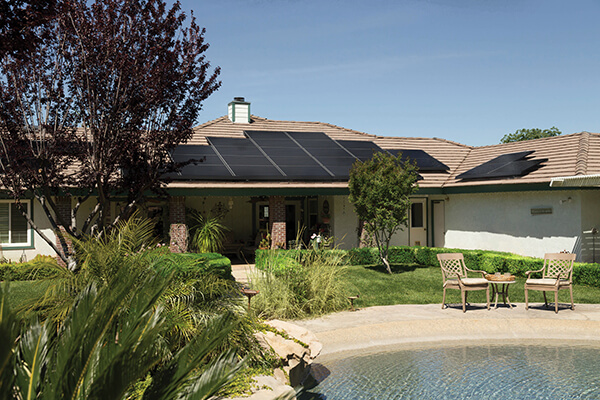 residential home with solar panels installed on the roof